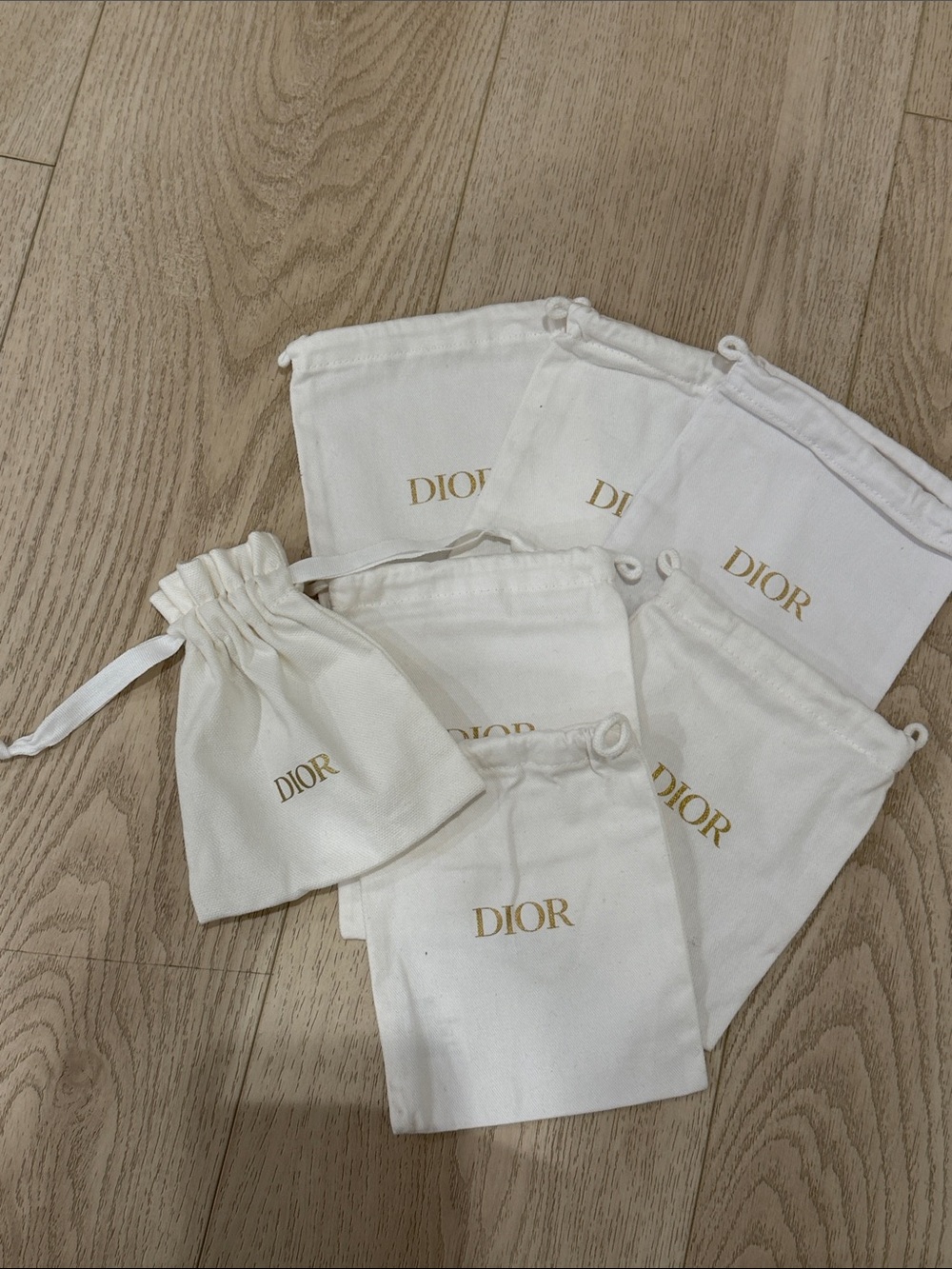 Dior Cream Drawstring Pouches with Gold Logo - Set of 7 - Picture 6 of 9